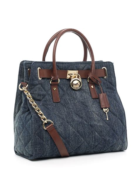 blue michael kors purse with tan straps|Michael Kors blue denim purse.